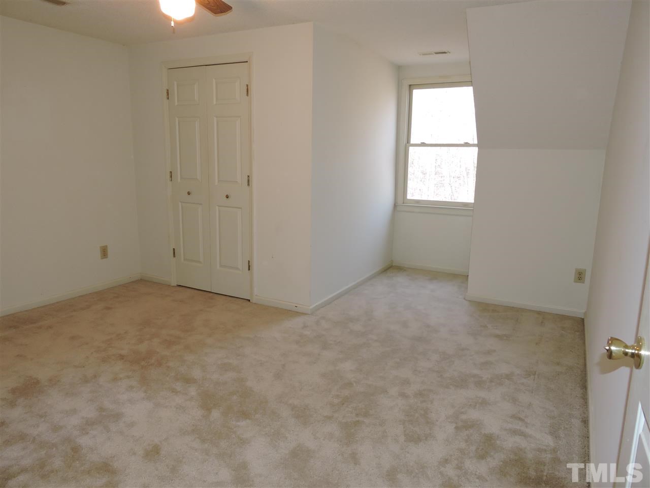 250 Kiser Hicks Road Roxboro, NC 27574 - Photo 14 of 19 an empty room with windows