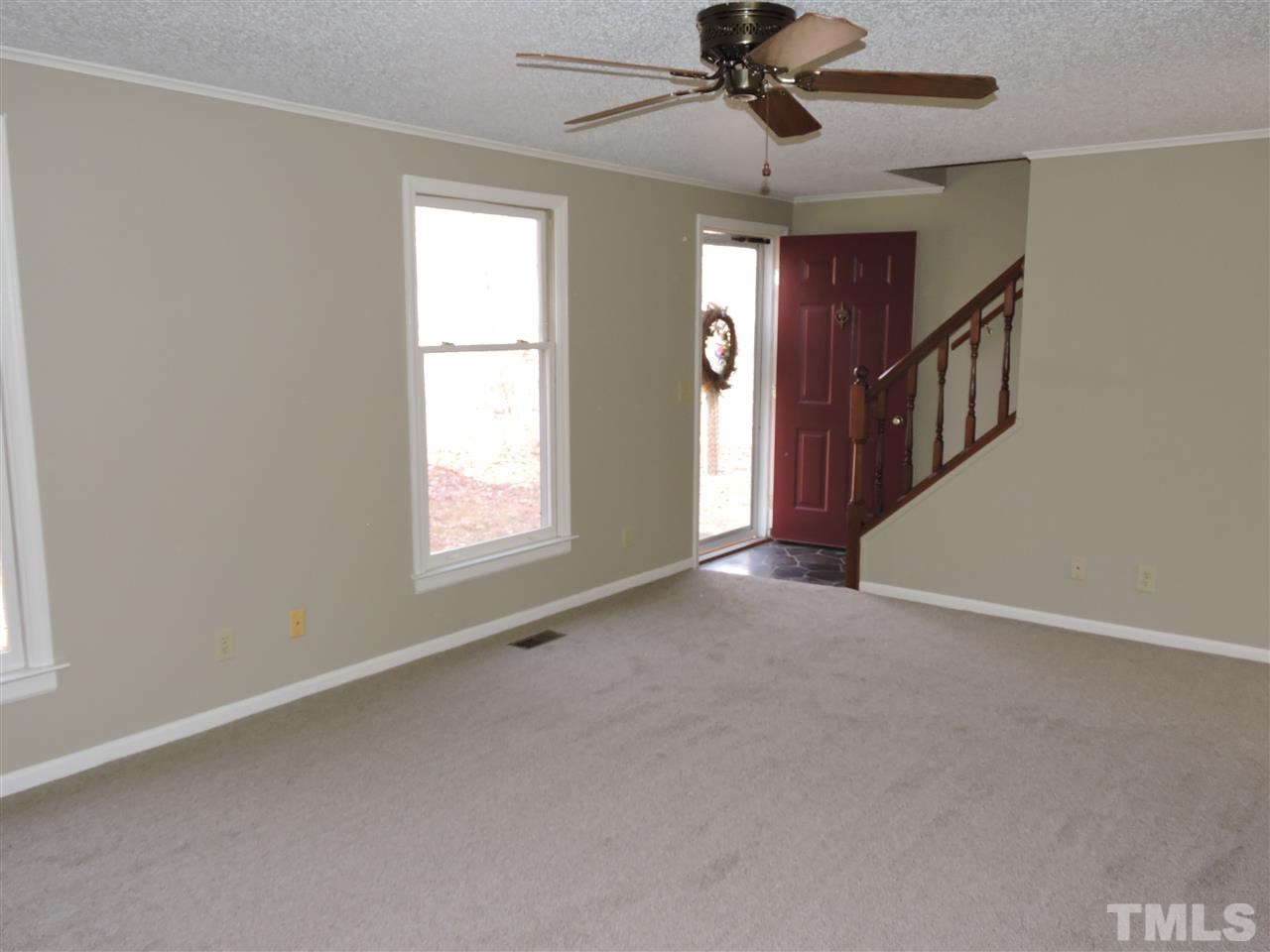 250 Kiser Hicks Road Roxboro, NC 27574 - Photo 4 of 19 a view of an empty room with a window