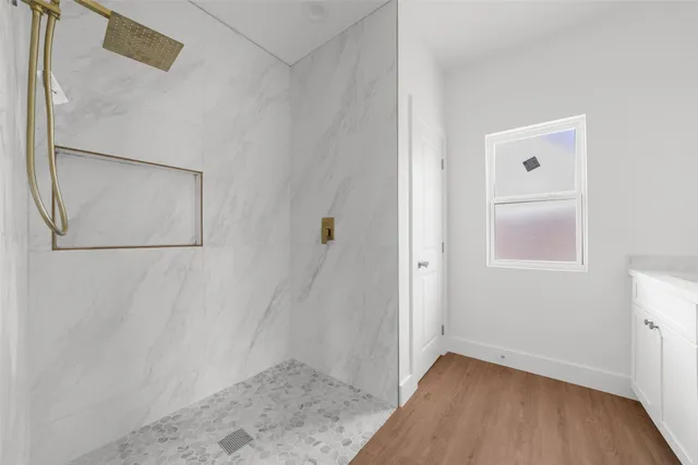 a view of bathroom with a shower