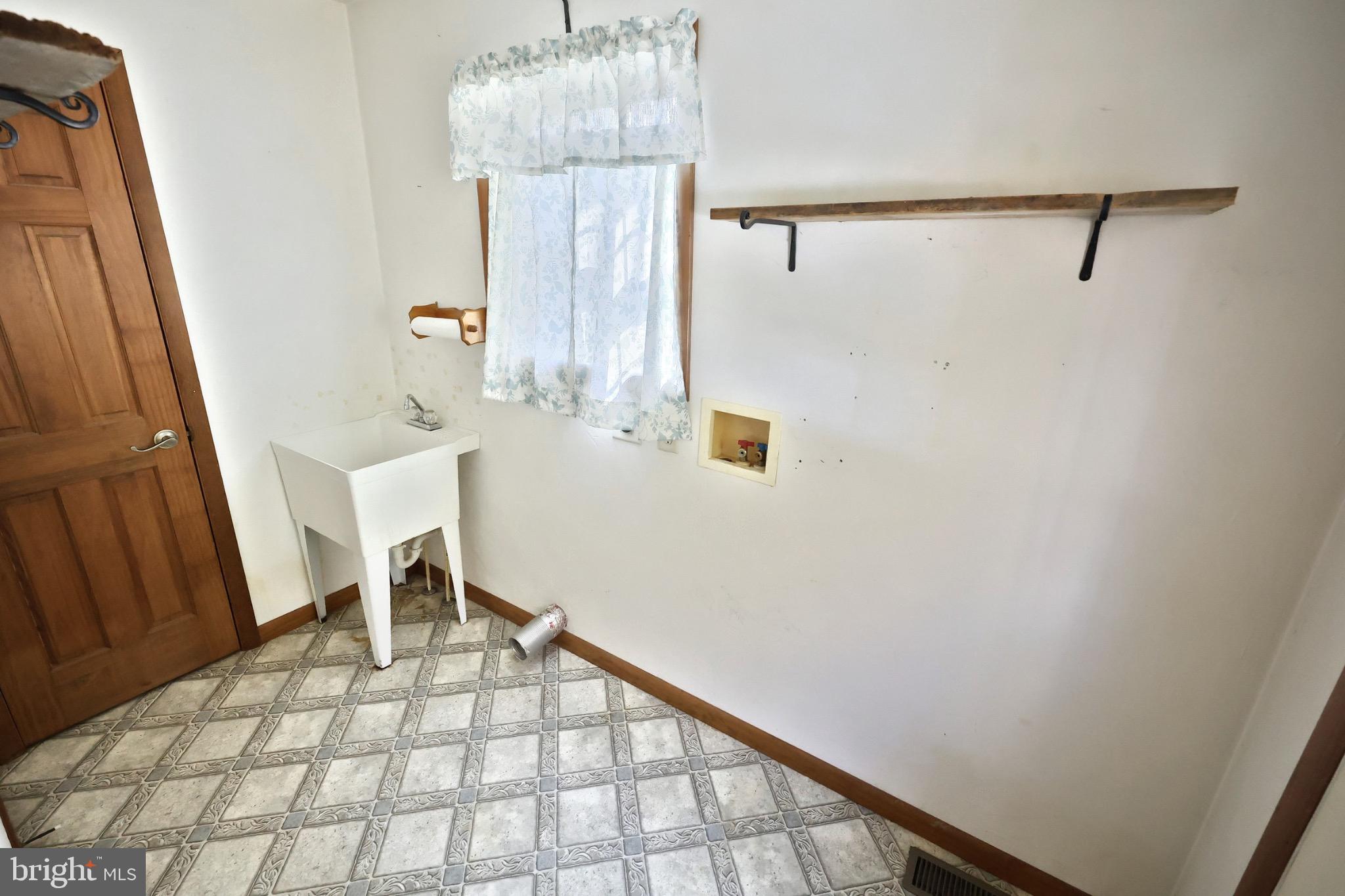 200 Slate Rock Road Biglerville, PA 17307 - Photo 11 of 43 a bathroom with a sink and a mirror