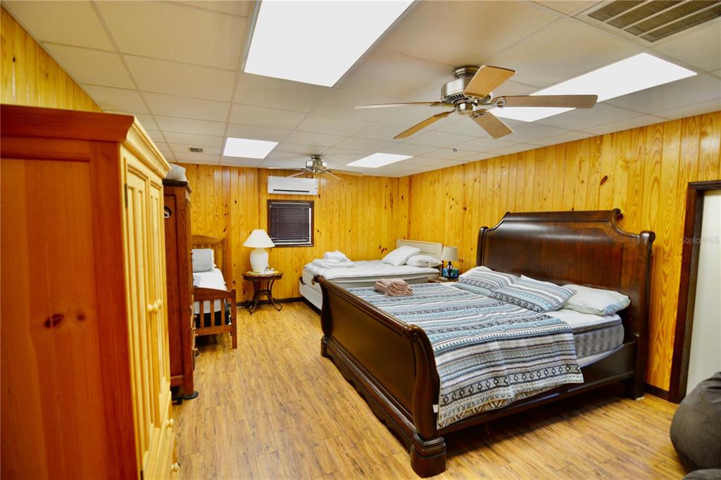 2669 Northwest Suwannee Valley Road White Springs, FL 32096 - Photo 34 of 66 a bed room with a bed and furniture