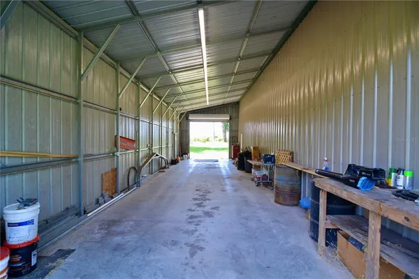 a view of outdoor space with trees all around