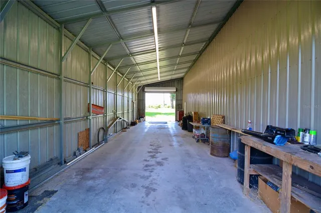 a view of outdoor space with trees all around