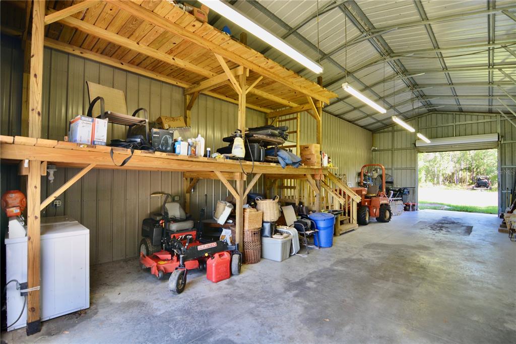 2669 Northwest Suwannee Valley Road White Springs, FL 32096 - Photo 42 of 66 a view of a storage room with a lot of stuff
