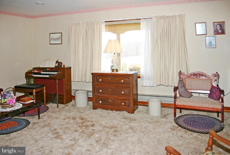 3570 Water Tank Road Manchester, MD 21102 - Photo 4 of 18 a living room with furniture and a window