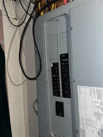 a close view of a utility room with dryer and washer