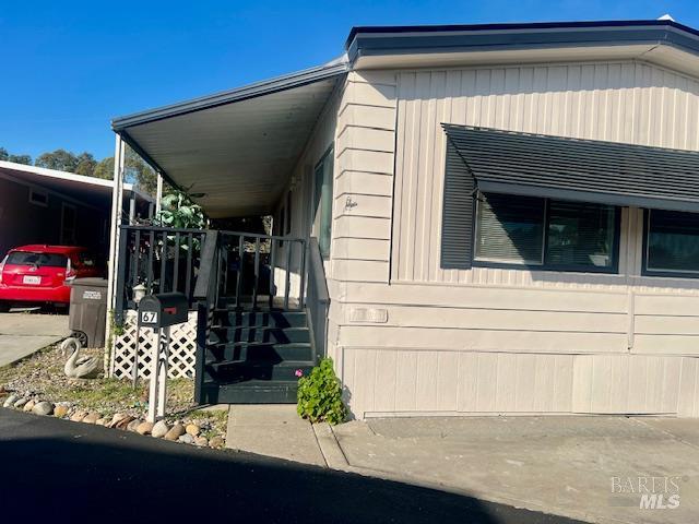 50 River Road, Unit SPC Isleton, CA 94571 - Photo 2 of 32 Has a porch to enjoy your coffee.