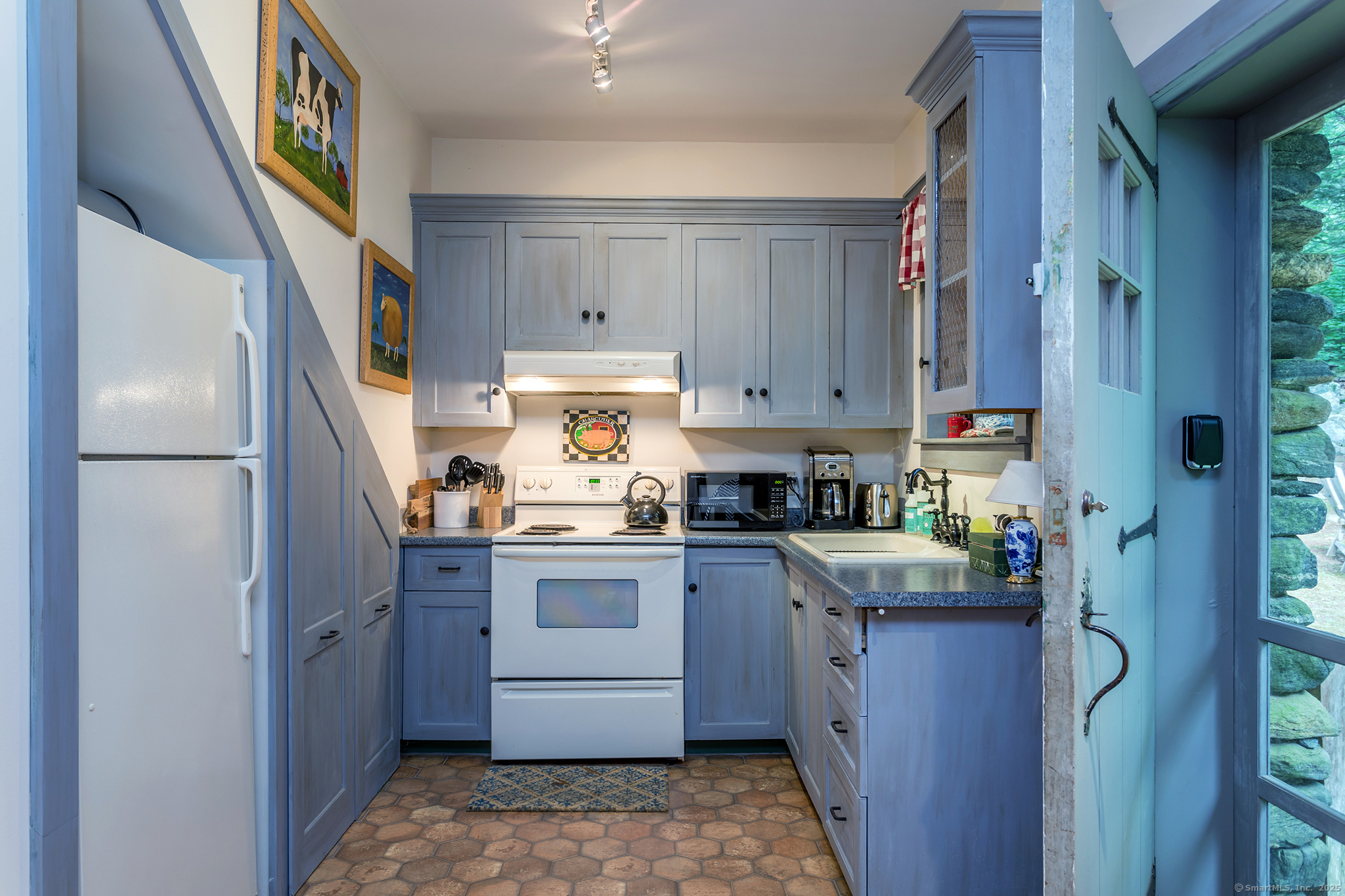 60 Leach Hollow Road Sherman, CT 06784 - Photo 13 of 24 a kitchen with stainless steel appliances granite countertop a refrigerator sink and cabinets