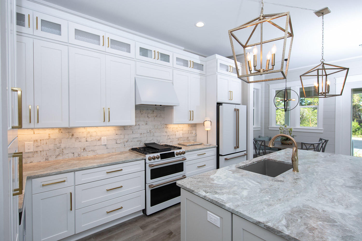 40 Kristin Court Santa Rosa Beach, FL 32459 - Photo 16 of 87 a kitchen with granite countertop a sink stainless steel appliances and cabinets