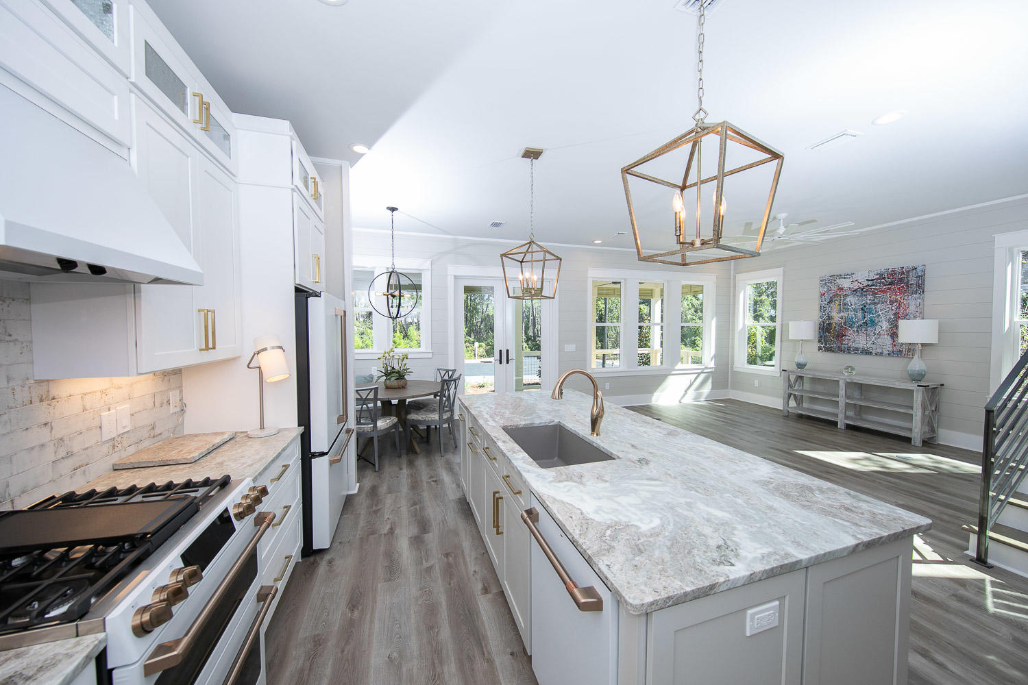 40 Kristin Court Santa Rosa Beach, FL 32459 - Photo 17 of 87 a kitchen with stainless steel appliances granite countertop a stove oven and a white cabinets