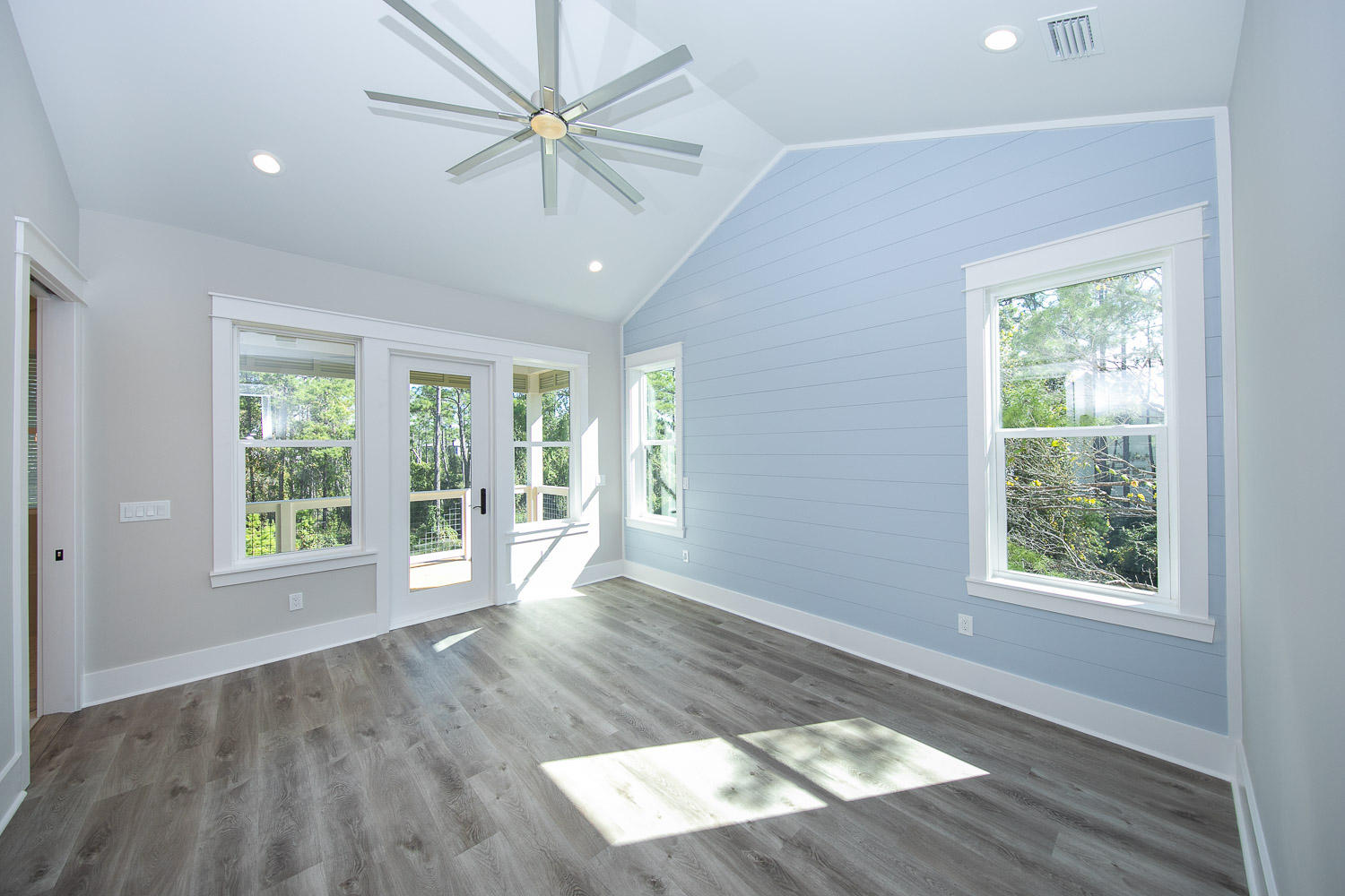 40 Kristin Court Santa Rosa Beach, FL 32459 - Photo 27 of 87 a view of an empty room with wooden floor and a window