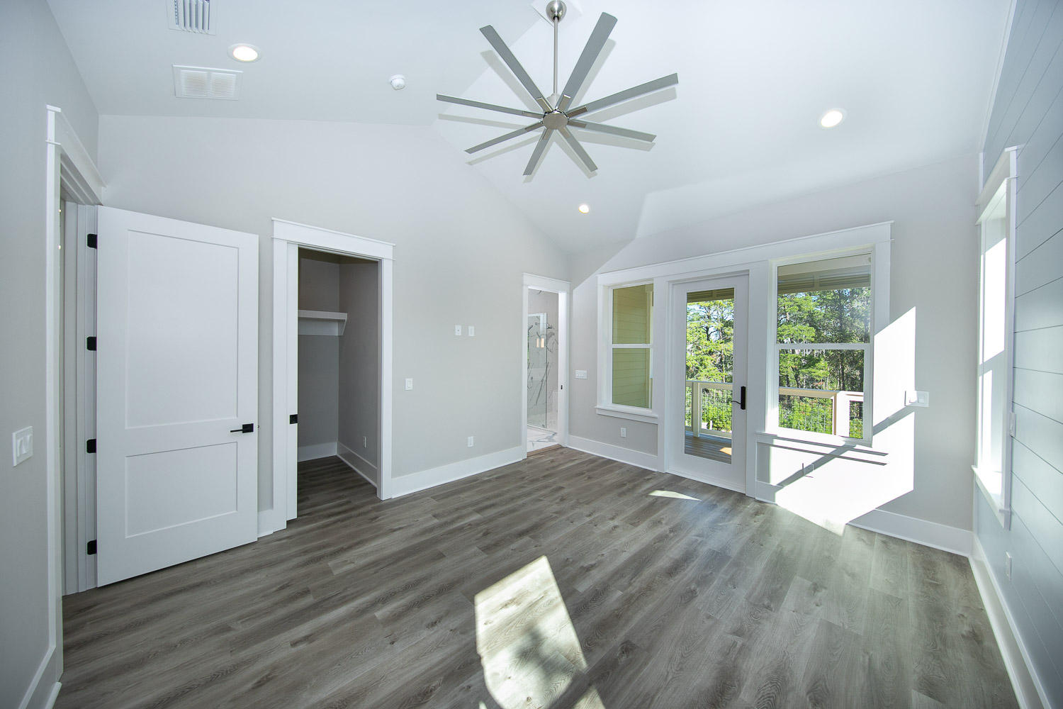 40 Kristin Court Santa Rosa Beach, FL 32459 - Photo 28 of 87 a view of an empty room with a window and wooden floor