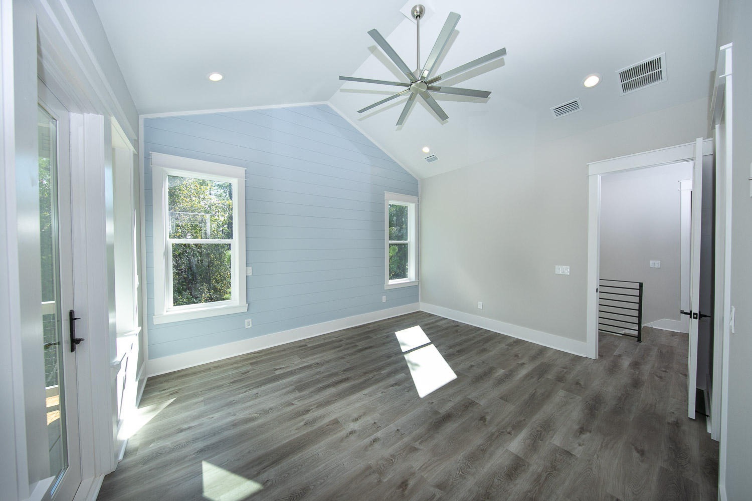 40 Kristin Court Santa Rosa Beach, FL 32459 - Photo 30 of 87 a view of an empty room with a window and wooden floor