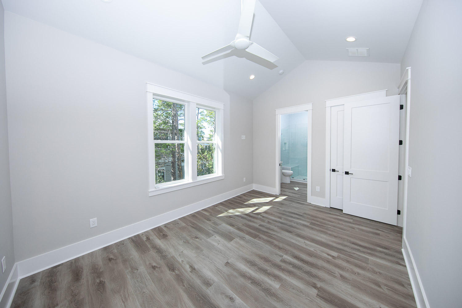 40 Kristin Court Santa Rosa Beach, FL 32459 - Photo 36 of 87 wooden floor in an empty room with a window
