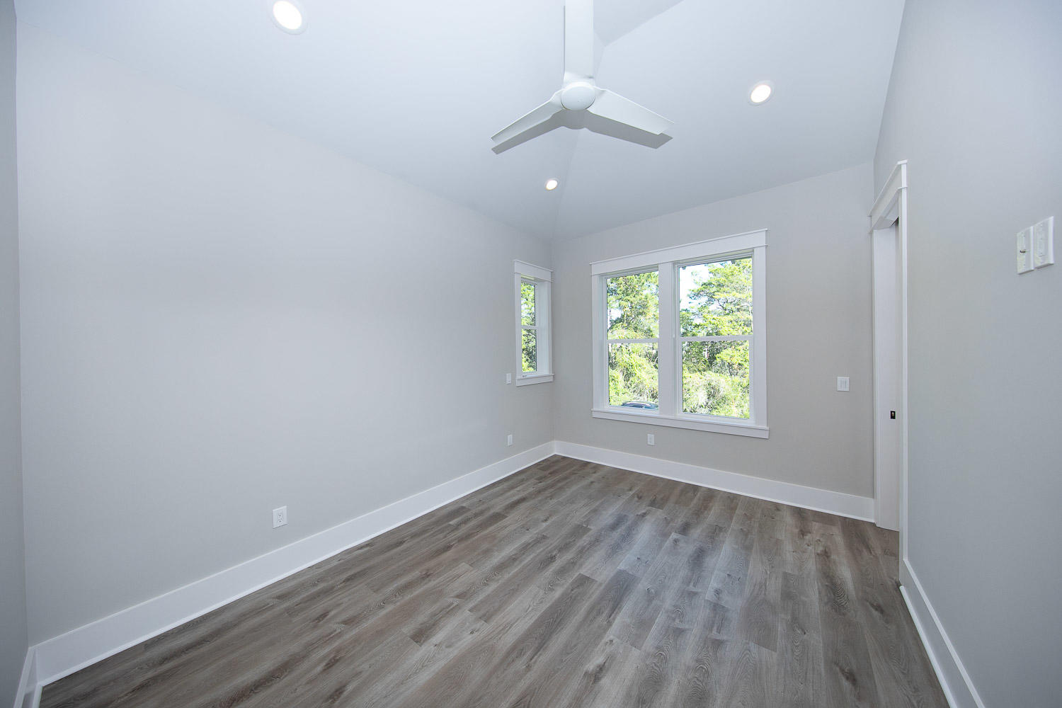 40 Kristin Court Santa Rosa Beach, FL 32459 - Photo 44 of 87 wooden floor in an empty room with a window