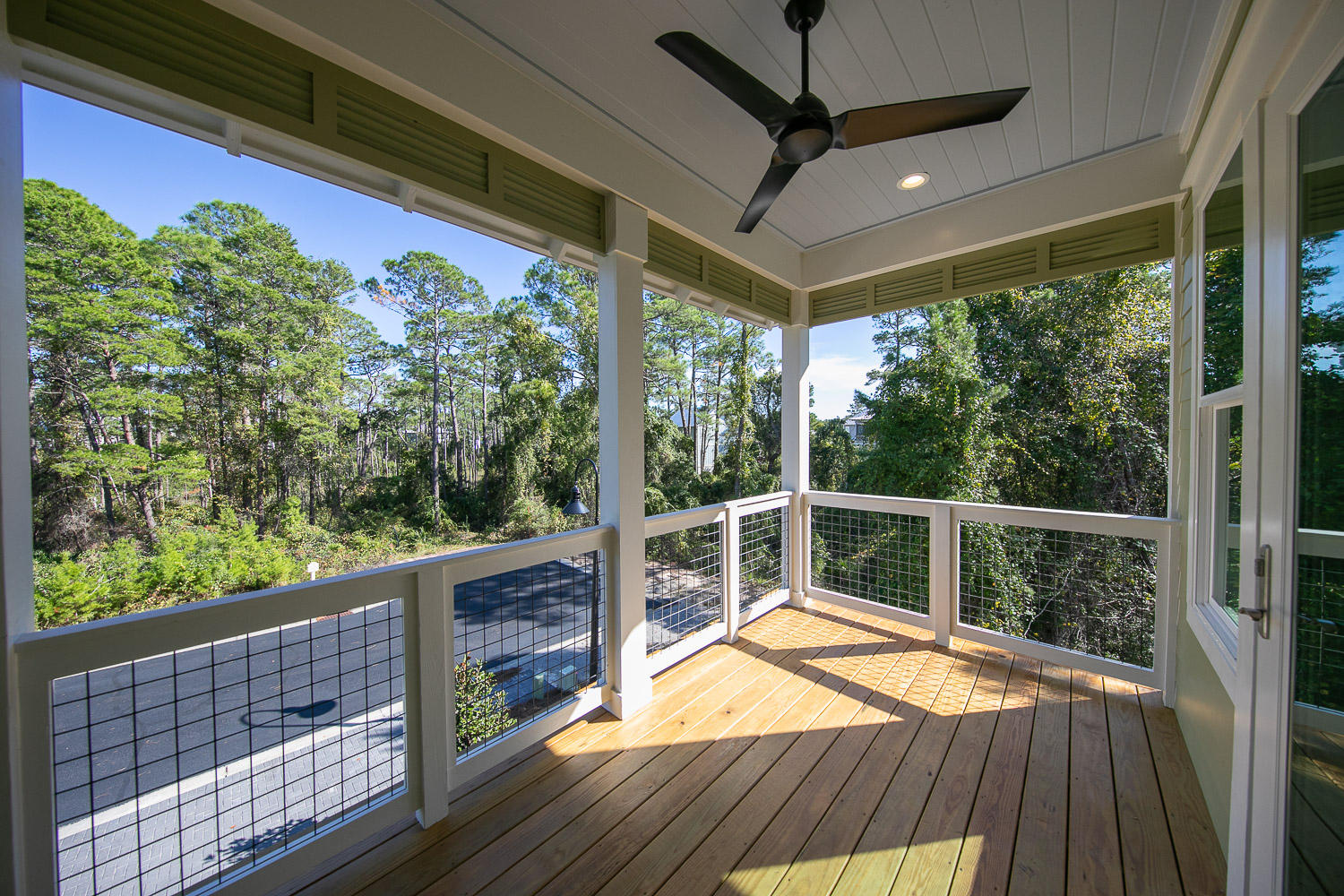 40 Kristin Court Santa Rosa Beach, FL 32459 - Photo 52 of 87 a view of balcony with wooden floor and iron fence