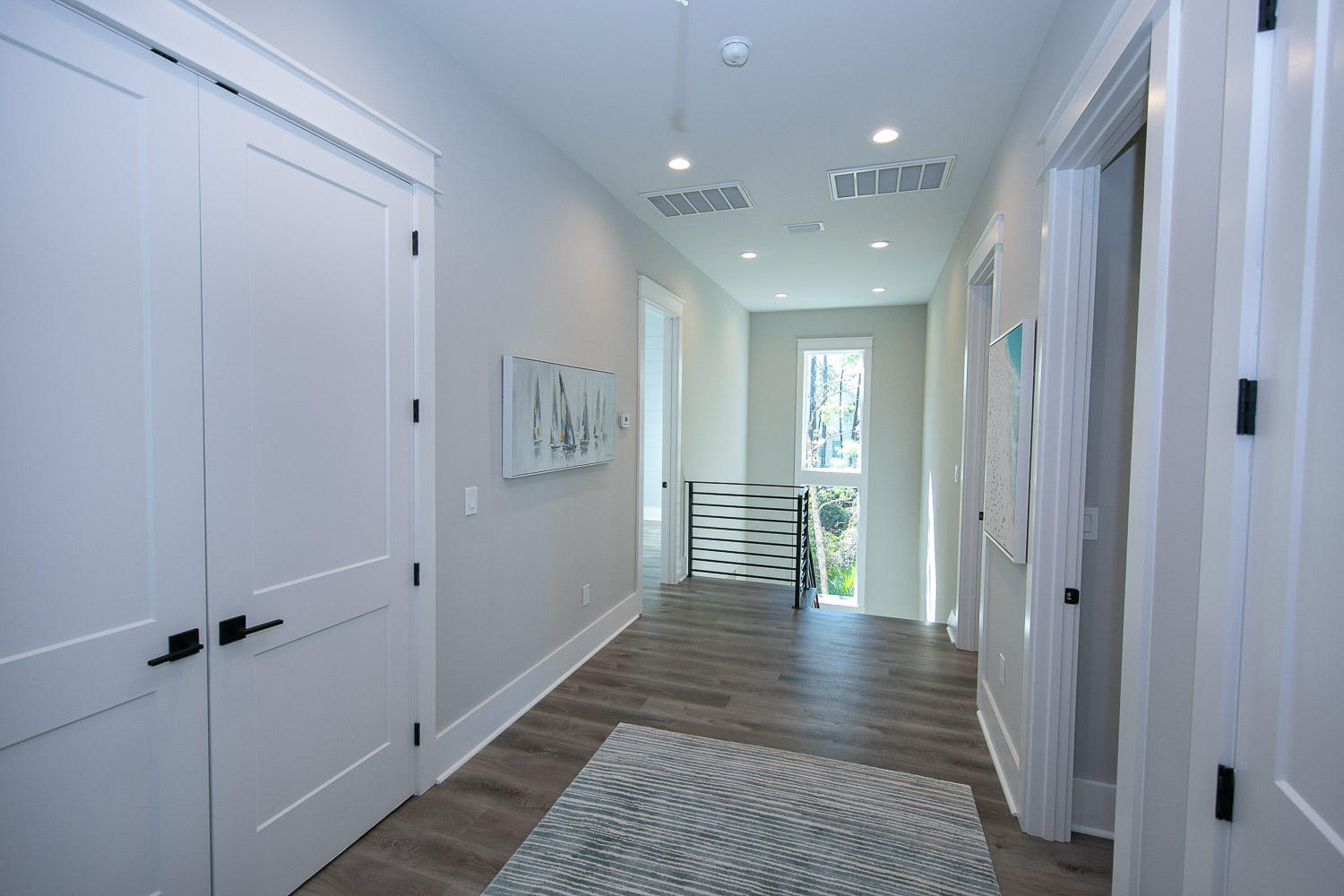 40 Kristin Court Santa Rosa Beach, FL 32459 - Photo 58 of 87 a view of a hallway with wooden floor
