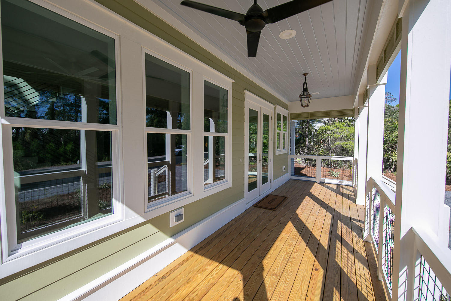 40 Kristin Court Santa Rosa Beach, FL 32459 - Photo 9 of 87 a view of a house with a large window and wooden floor