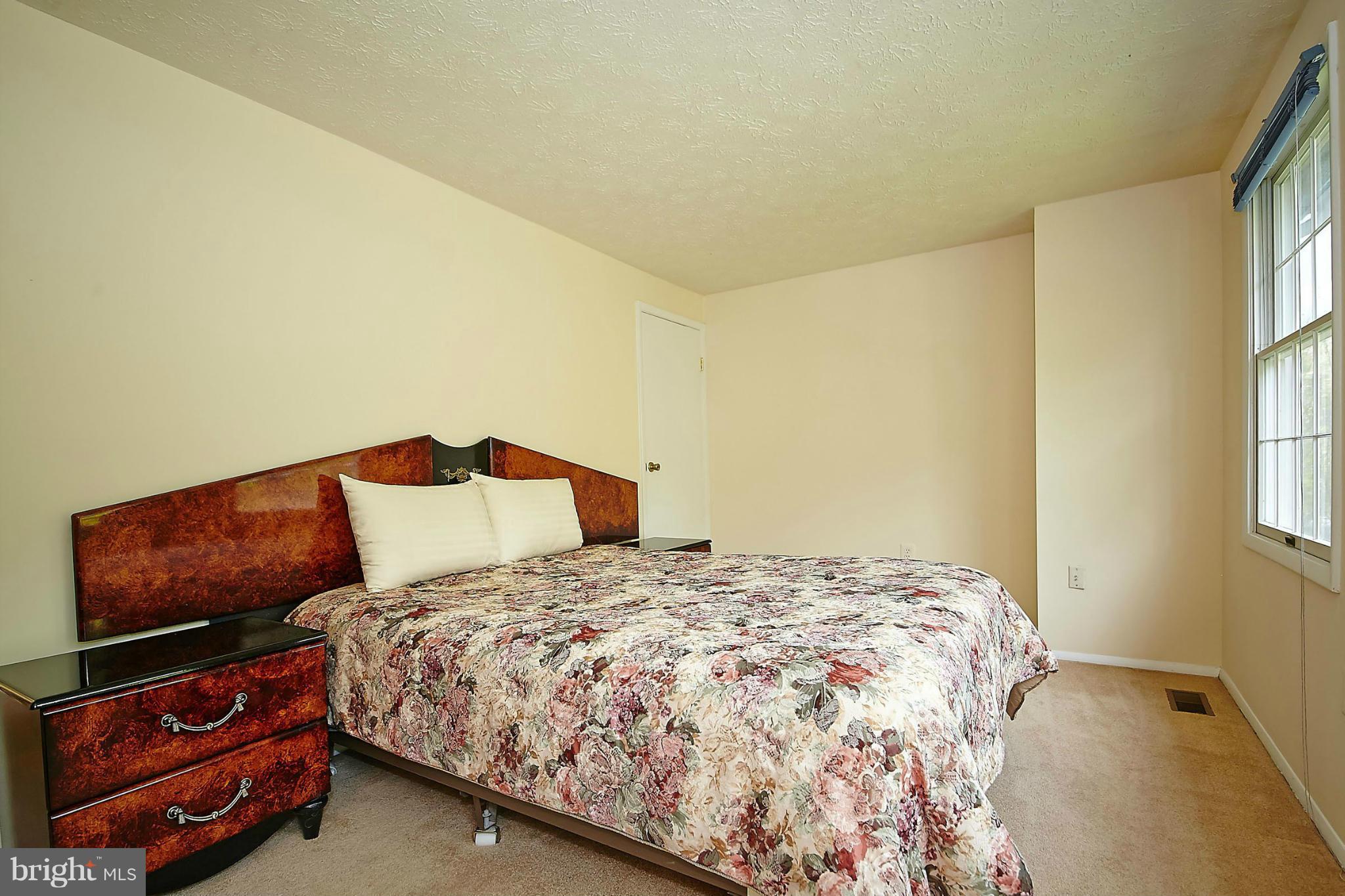 6256 Hillside Road Springfield, VA 22152 - Photo 16 of 30 a bedroom with a bed and a window