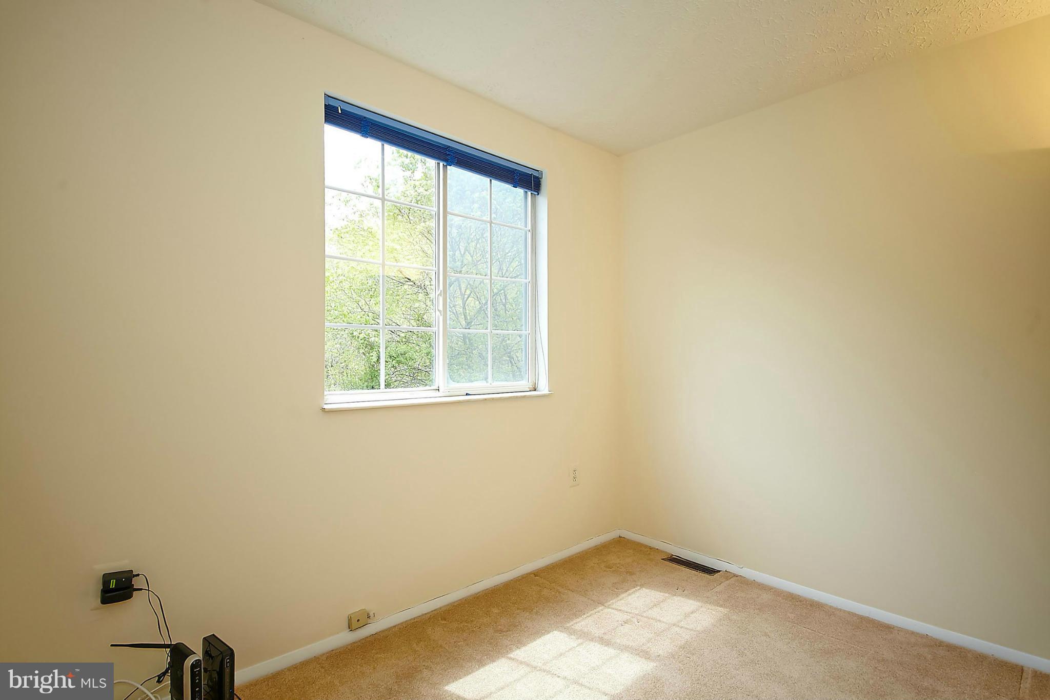 6256 Hillside Road Springfield, VA 22152 - Photo 21 of 30 an empty room with a window