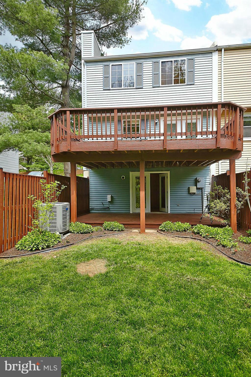 6256 Hillside Road Springfield, VA 22152 - Photo 27 of 30 a view of a house with a yard and sitting area