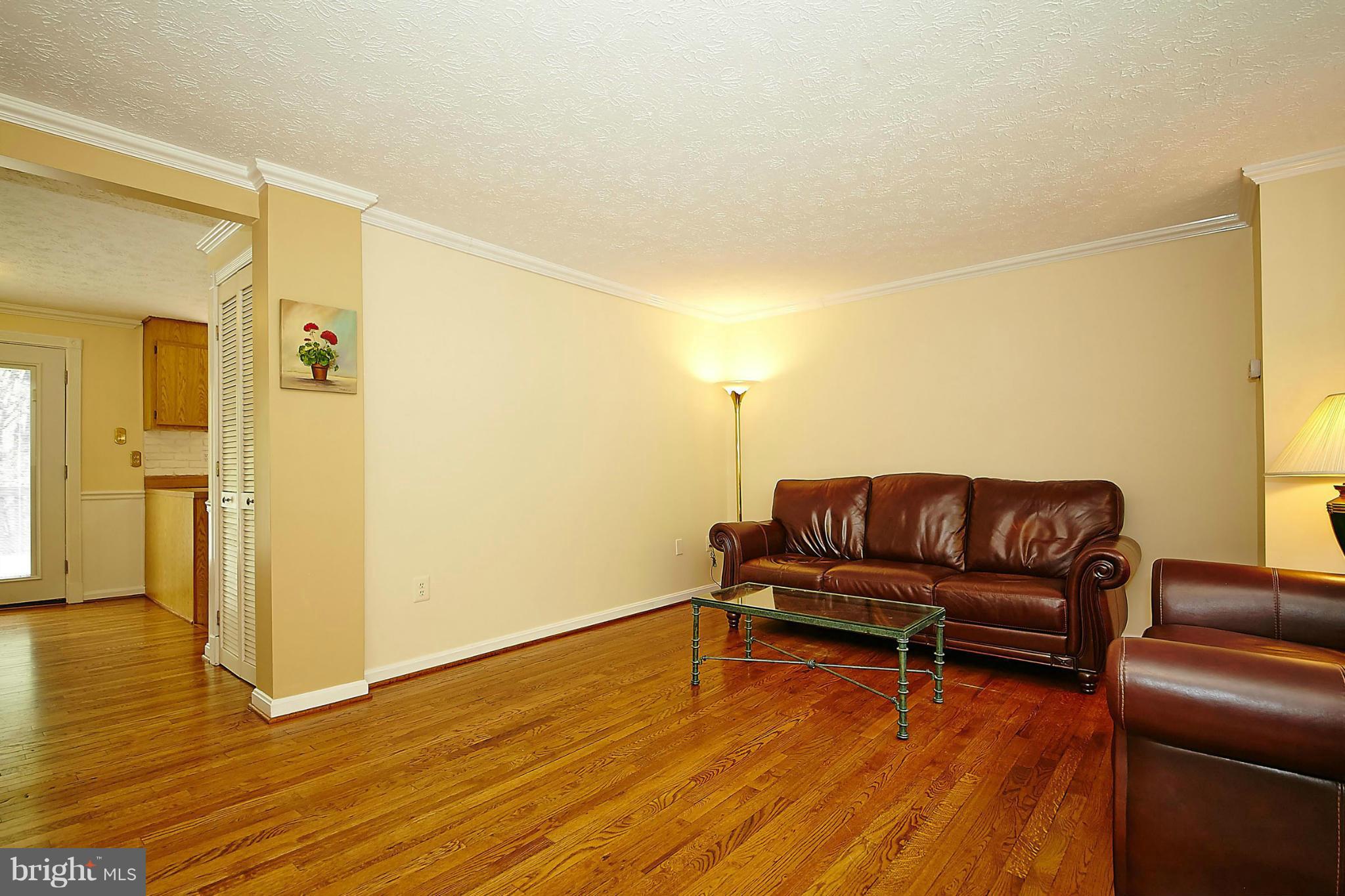6256 Hillside Road Springfield, VA 22152 - Photo 6 of 30 a living room with furniture and a wooden floor