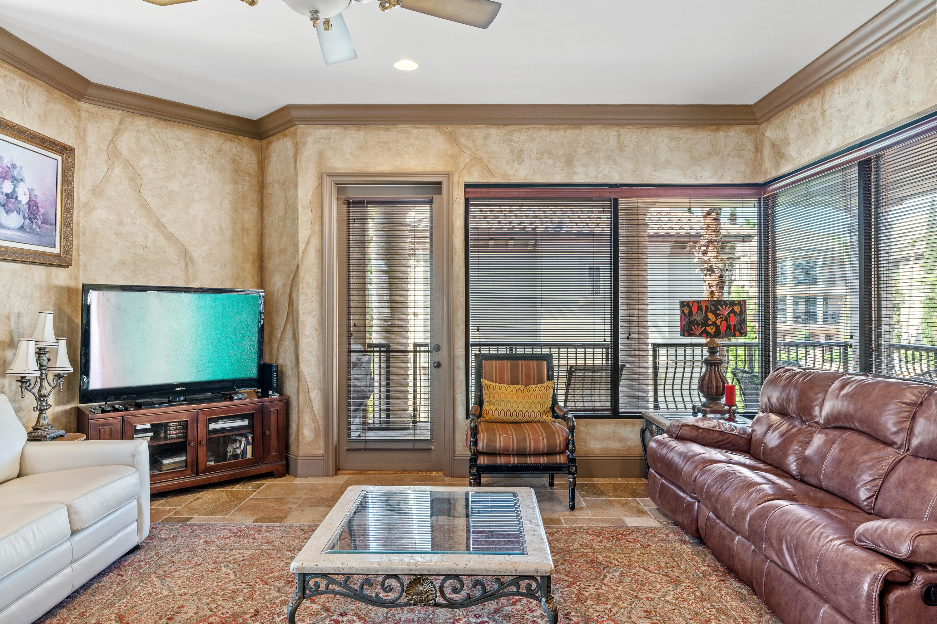 58 Rue St Tropez Miramar Beach, FL 32550 - Photo 16 of 59 a living room with furniture and a flat screen tv