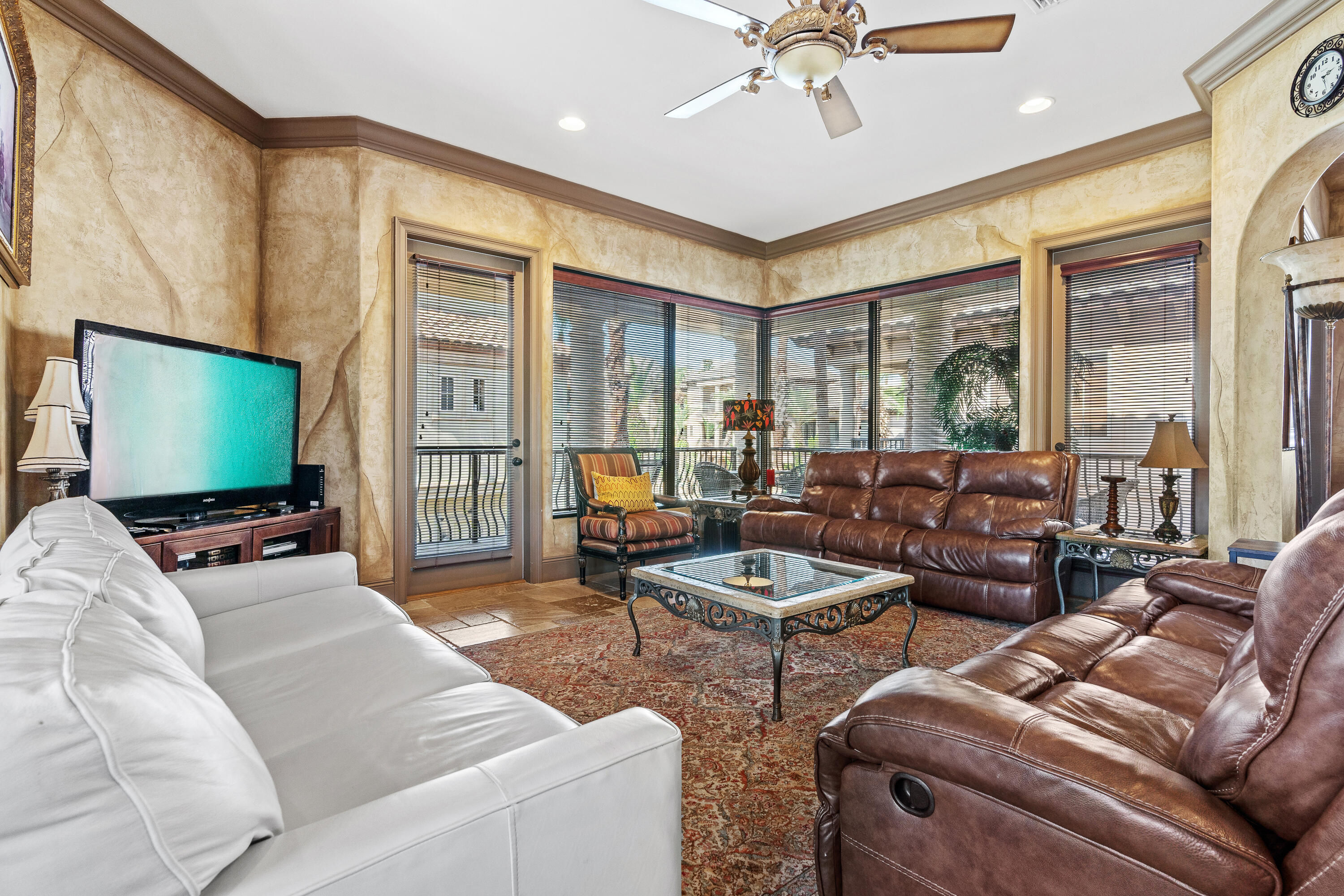 58 Rue St Tropez Miramar Beach, FL 32550 - Photo 18 of 59 a living room with furniture and a flat screen tv