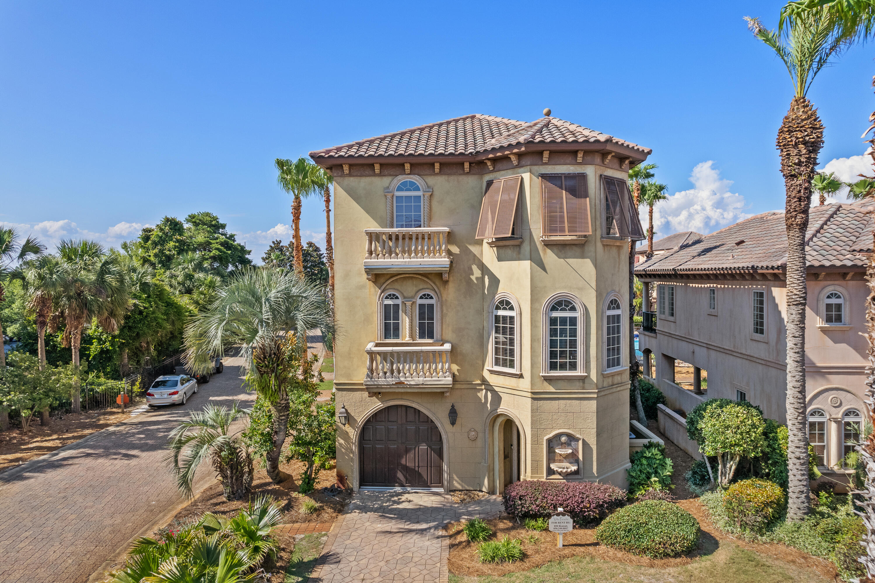 58 Rue St Tropez Miramar Beach, FL 32550 - Photo 59 of 59 a front view of a house with plants