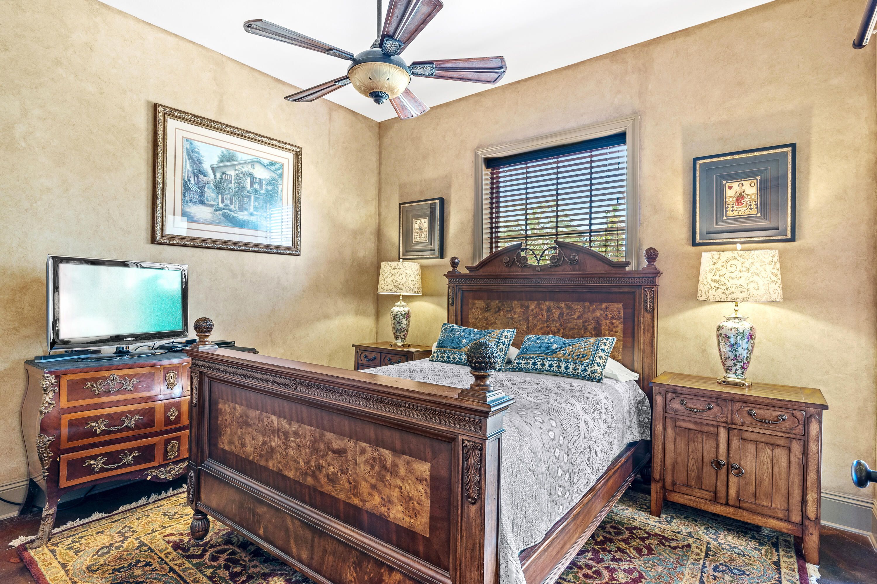 58 Rue St Tropez Miramar Beach, FL 32550 - Photo 6 of 59 a bedroom with a bed and a flat screen tv