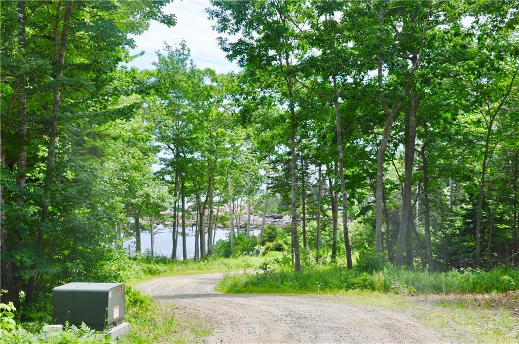 4 Harbor Hill Chamberlain, ME 04541 - Photo 2 of 4 Going down the hill from lot this lot.