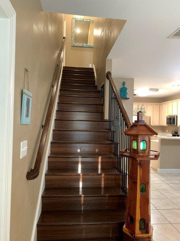54 Batchelors Button Drive, Unit 9 Miramar Beach, FL 32550 - Photo 15 of 28 a view of entryway and hall with wooden floor