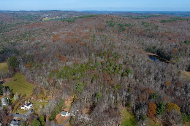 an aerial view of a golf course with a yard