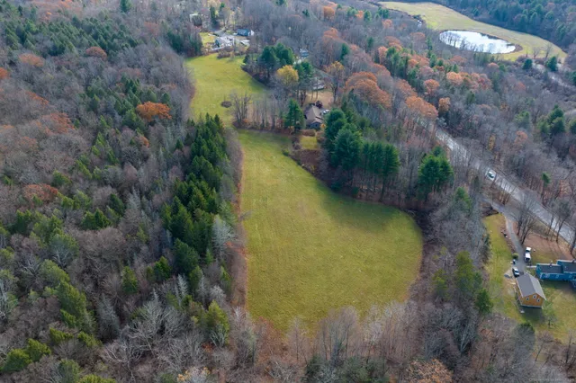 a view of a lake in middle of the house