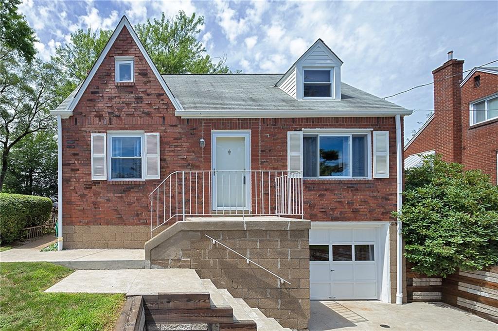 907 Hamil Road Verona, PA 15147 - Photo 1 of 21 a front view of a house with a yard