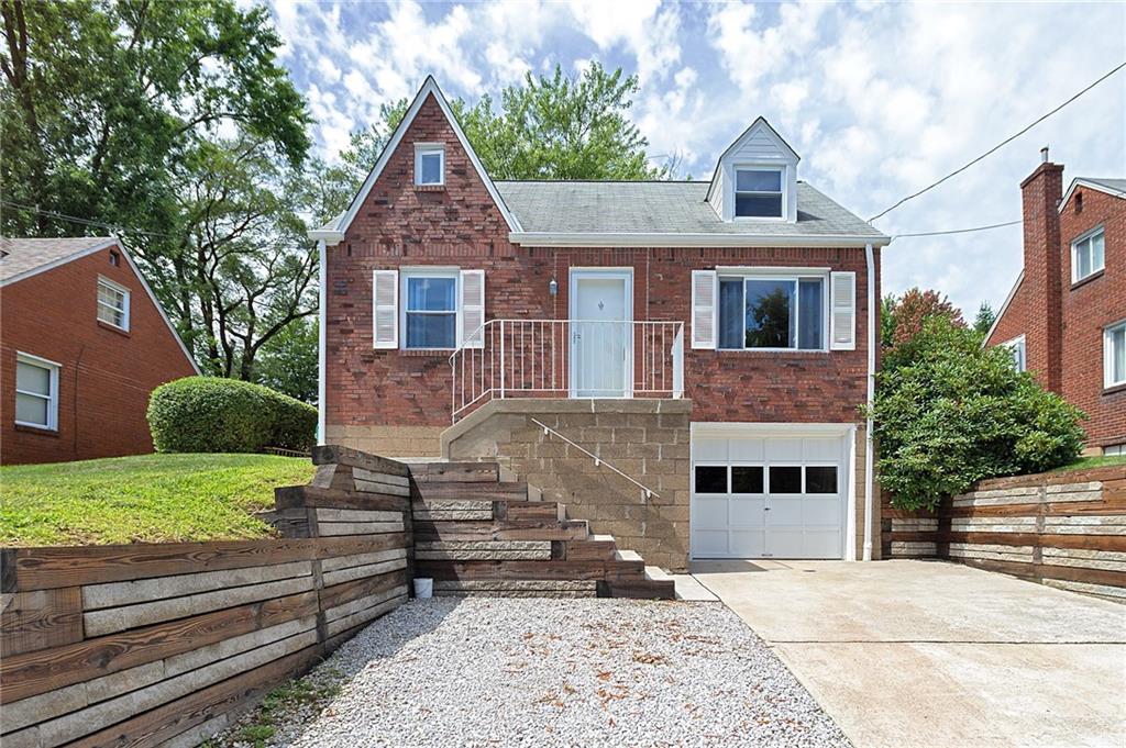 907 Hamil Road Verona, PA 15147 - Photo 2 of 21 a front view of a house with garden