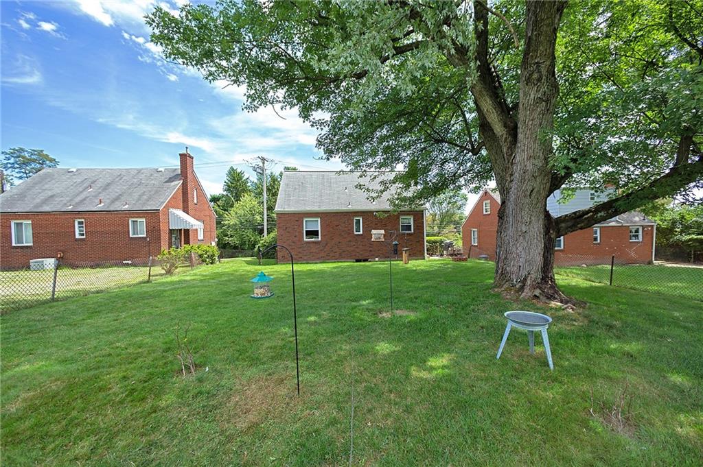 907 Hamil Road Verona, PA 15147 - Photo 4 of 21 a house view with a sitting space and garden