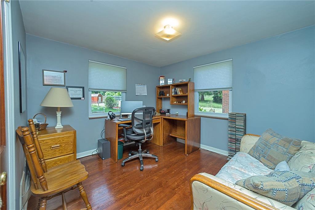 907 Hamil Road Verona, PA 15147 - Photo 9 of 21 a living room with furniture and a wooden floor
