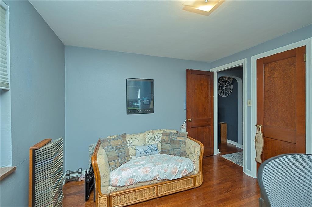 907 Hamil Road Verona, PA 15147 - Photo 10 of 21 a living room with furniture and a window