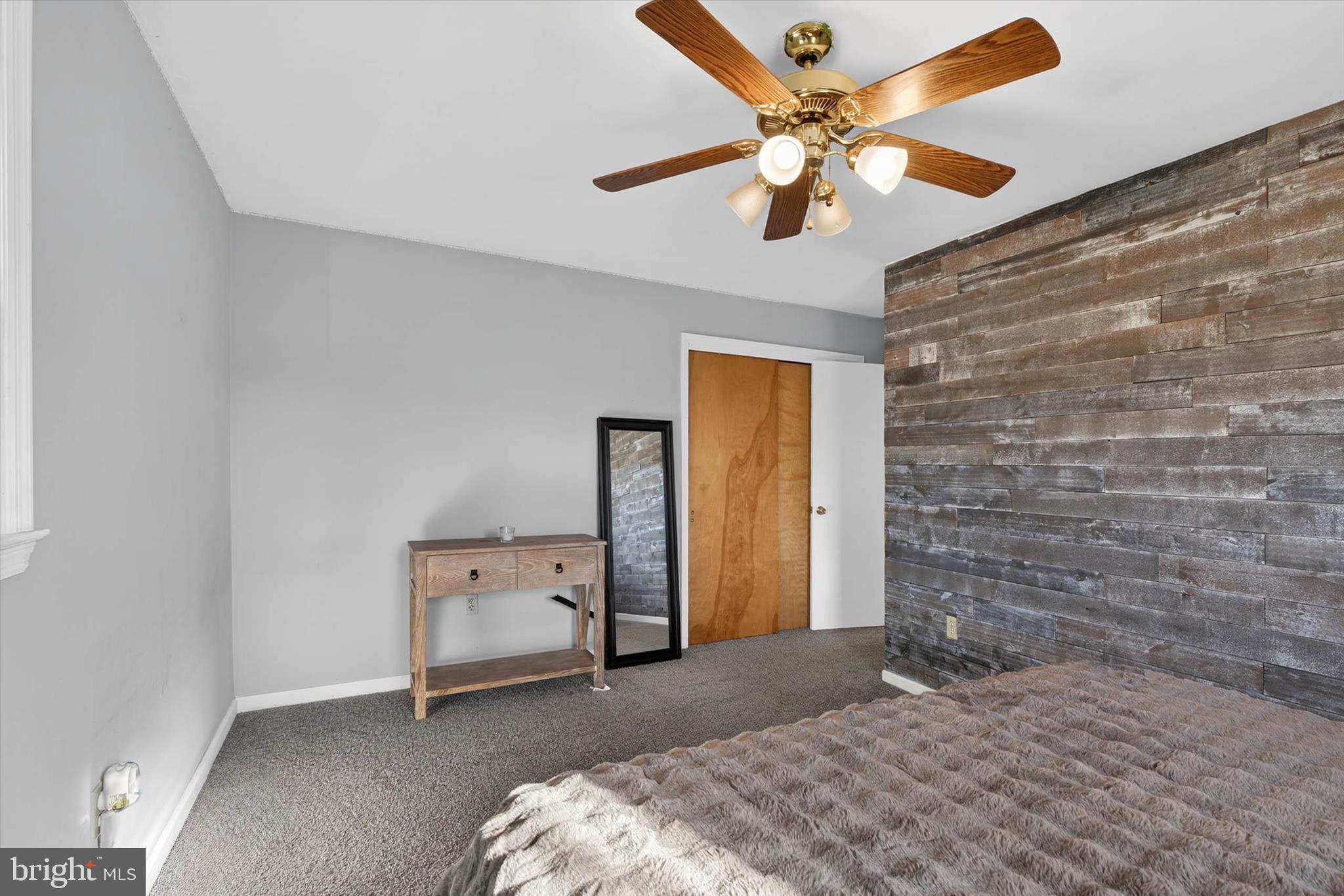 27 Rosemont Avenue Reading, PA 19607 - Photo 16 of 49 a bedroom with a bed and a ceiling fan