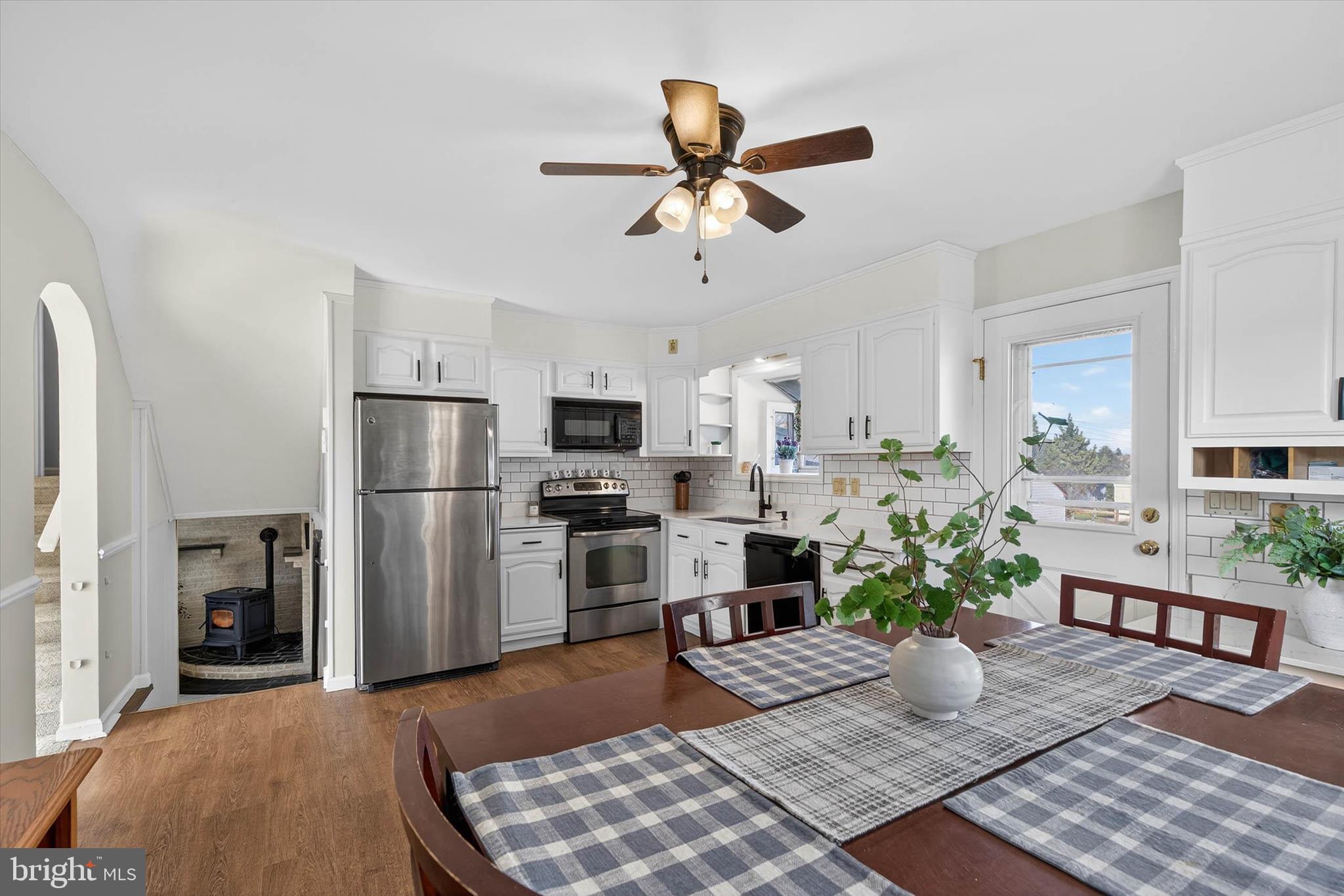 27 Rosemont Avenue Reading, PA 19607 - Photo 8 of 49 a living room with furniture windows and a fireplace
