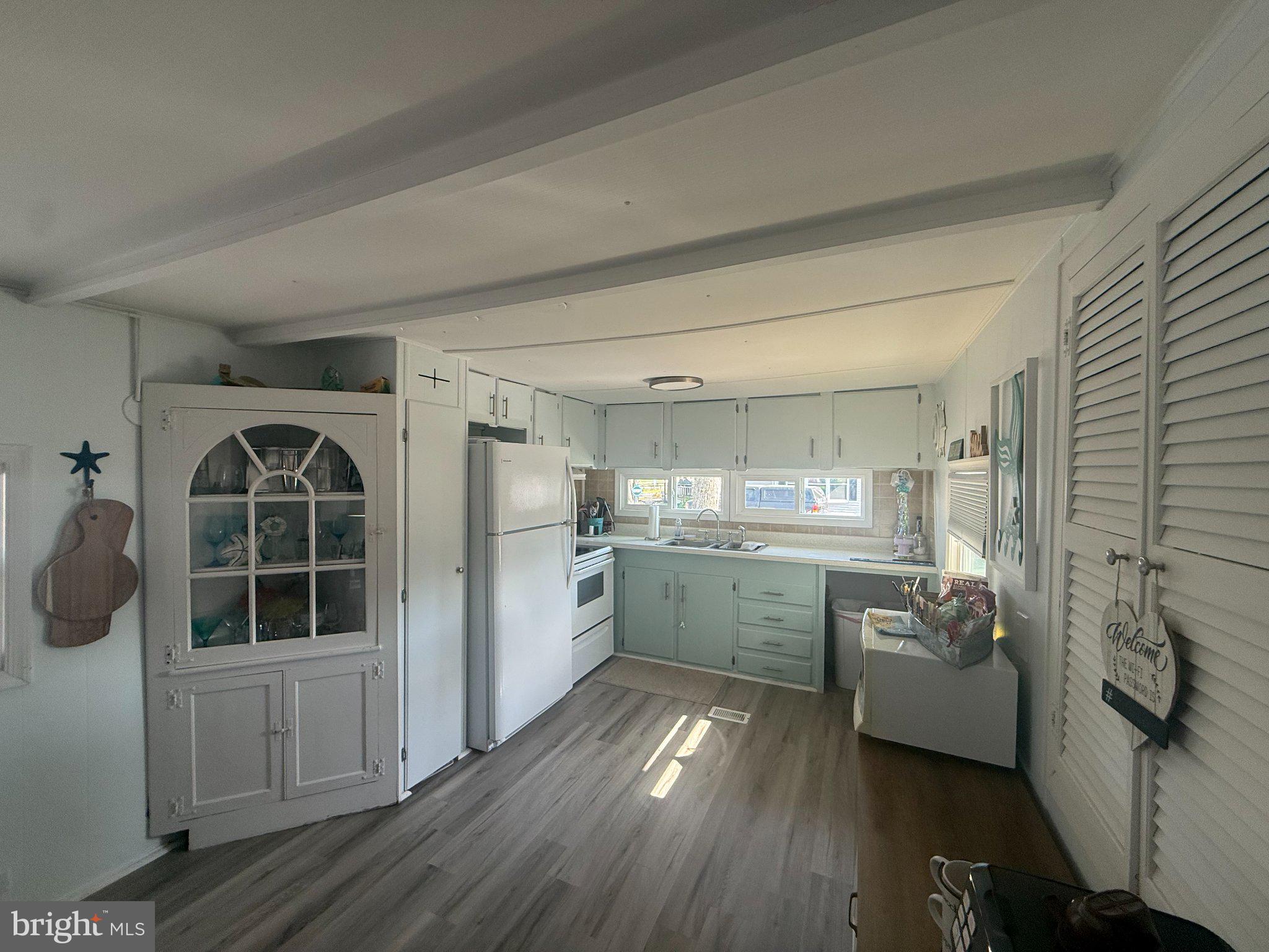 34291 Bayberry Road Millsboro, DE 19966 - Photo 33 of 41 Bright and airy coastal kitchen retreat.