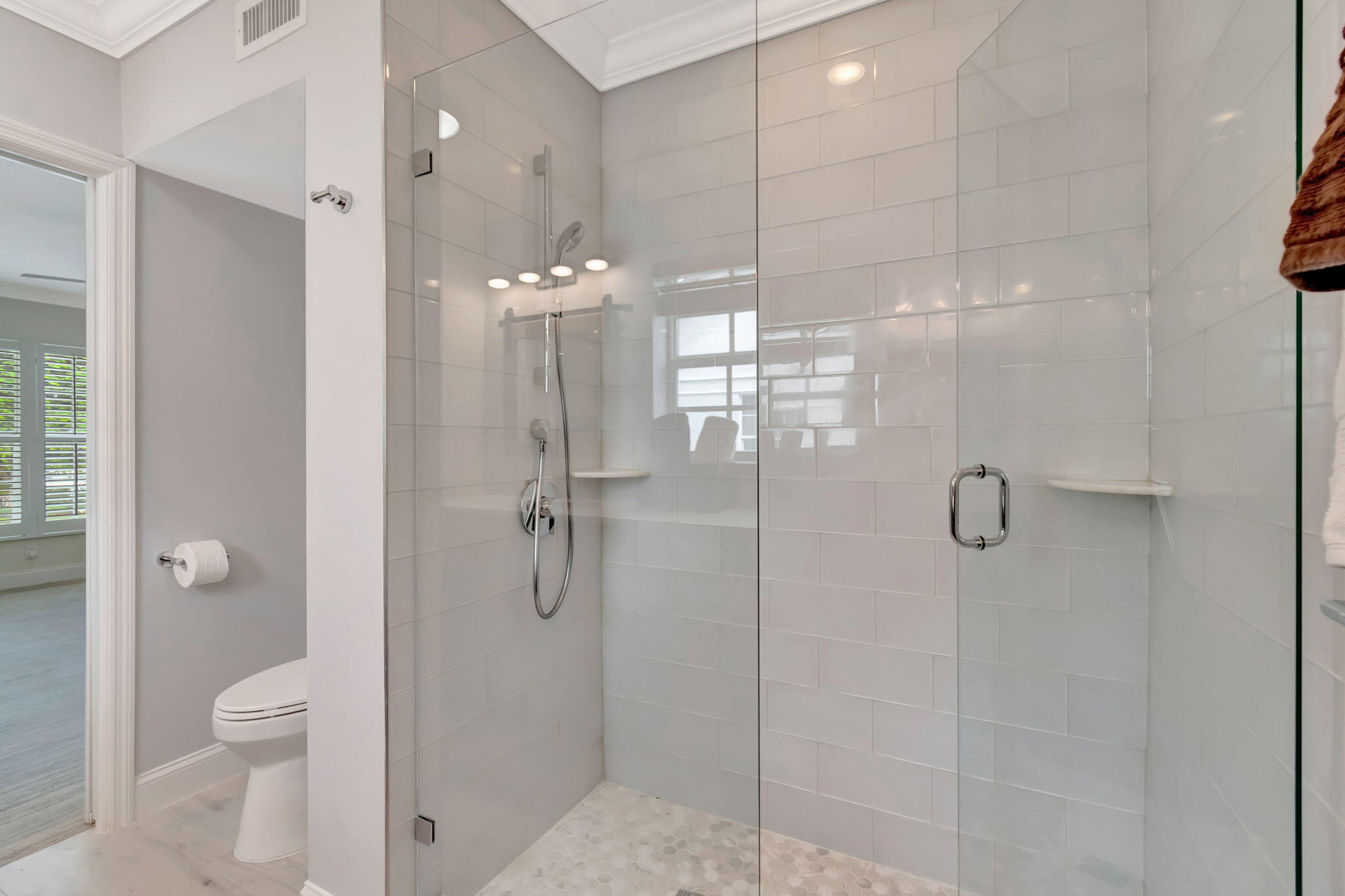 1710 South Ocean Boulevard, Unit 32 Delray Beach, FL 33483 - Photo 23 of 58 a bathroom with a shower a toilet and a sink