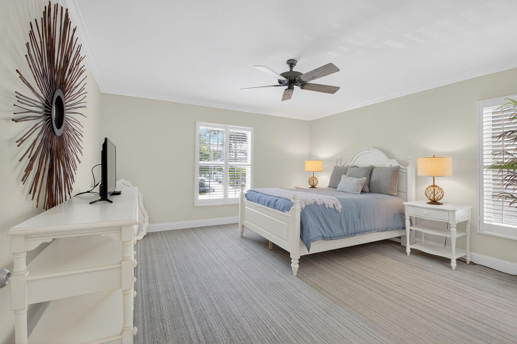 1710 South Ocean Boulevard, Unit 32 Delray Beach, FL 33483 - Photo 27 of 58 a bedroom with a bed and a window