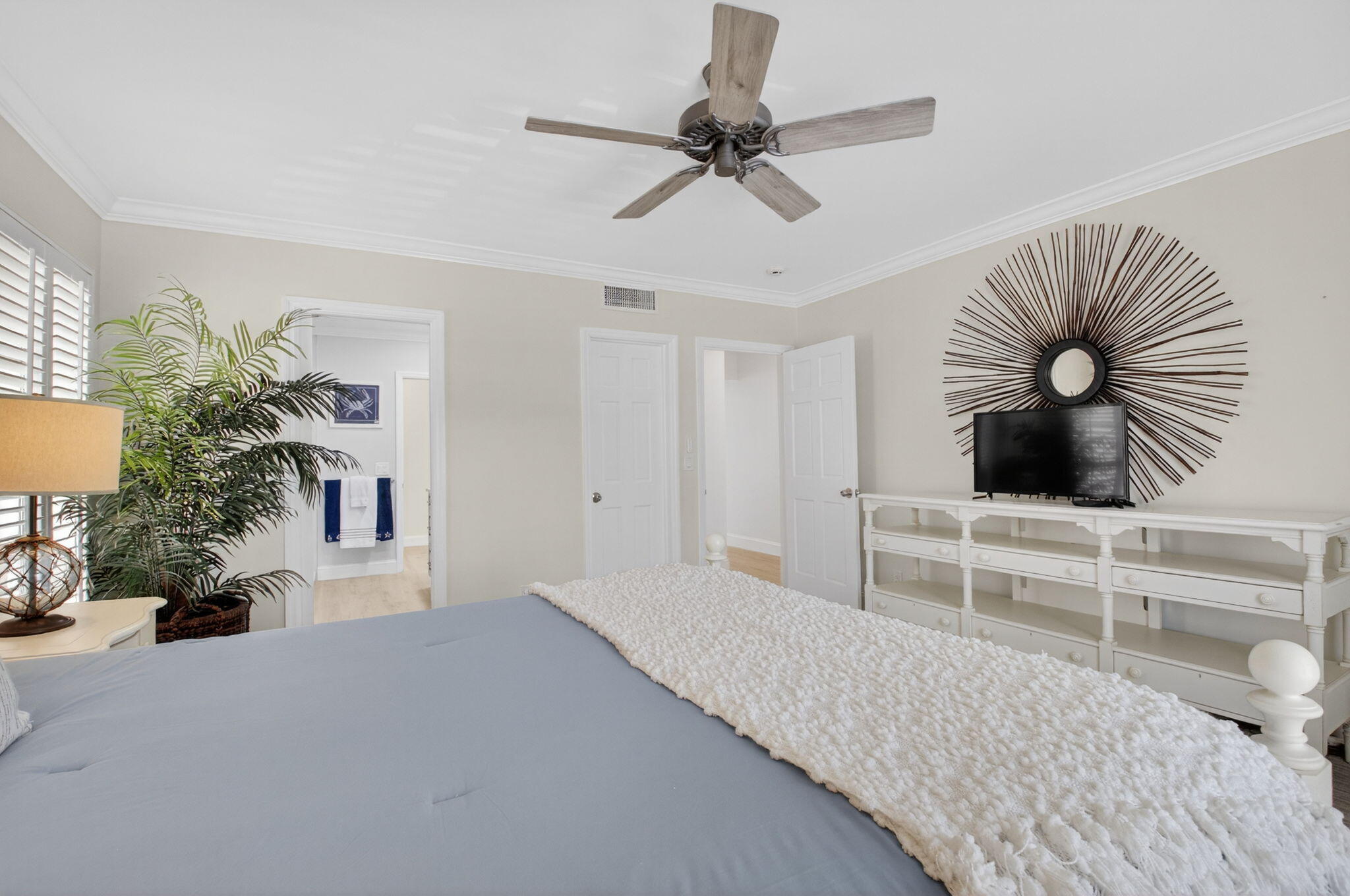 1710 South Ocean Boulevard, Unit 32 Delray Beach, FL 33483 - Photo 28 of 58 a bedroom with furniture and a bed