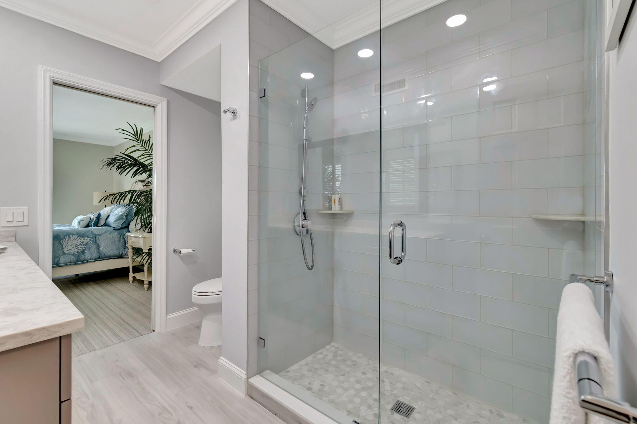 1710 South Ocean Boulevard, Unit 32 Delray Beach, FL 33483 - Photo 30 of 58 a bathroom with a shower a toilet and sink