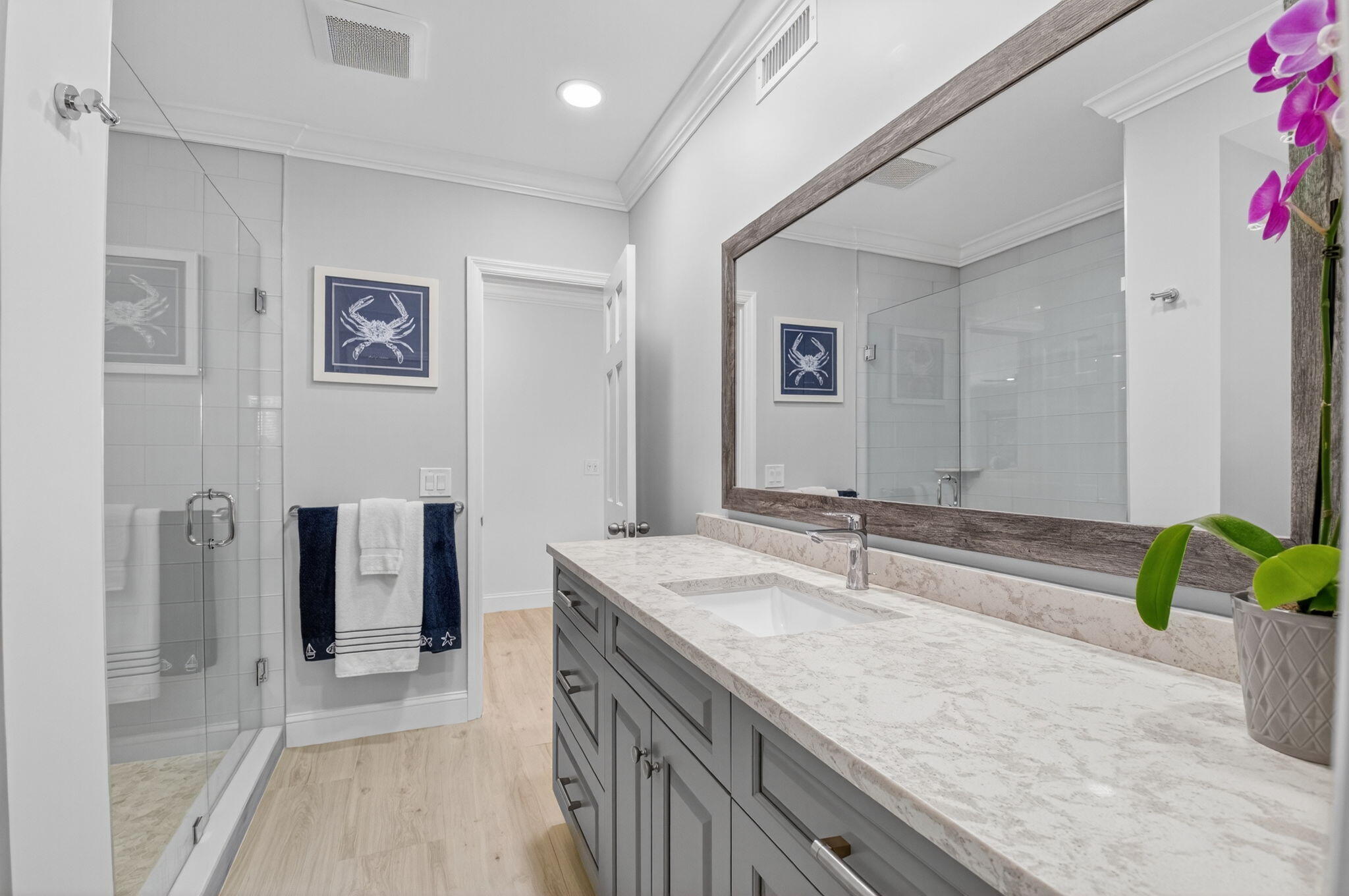 1710 South Ocean Boulevard, Unit 32 Delray Beach, FL 33483 - Photo 31 of 58 a bathroom with a granite countertop sink a mirror and shower