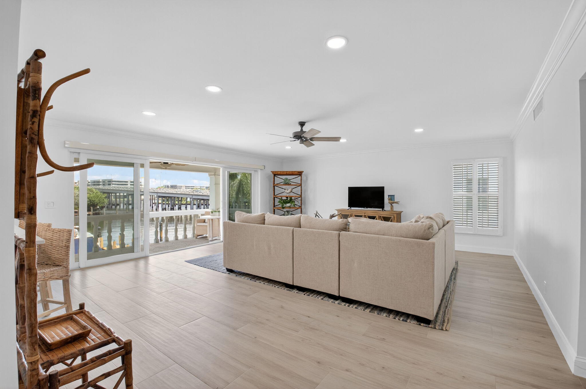 1710 South Ocean Boulevard, Unit 32 Delray Beach, FL 33483 - Photo 5 of 58 a living room with furniture and a flat screen tv