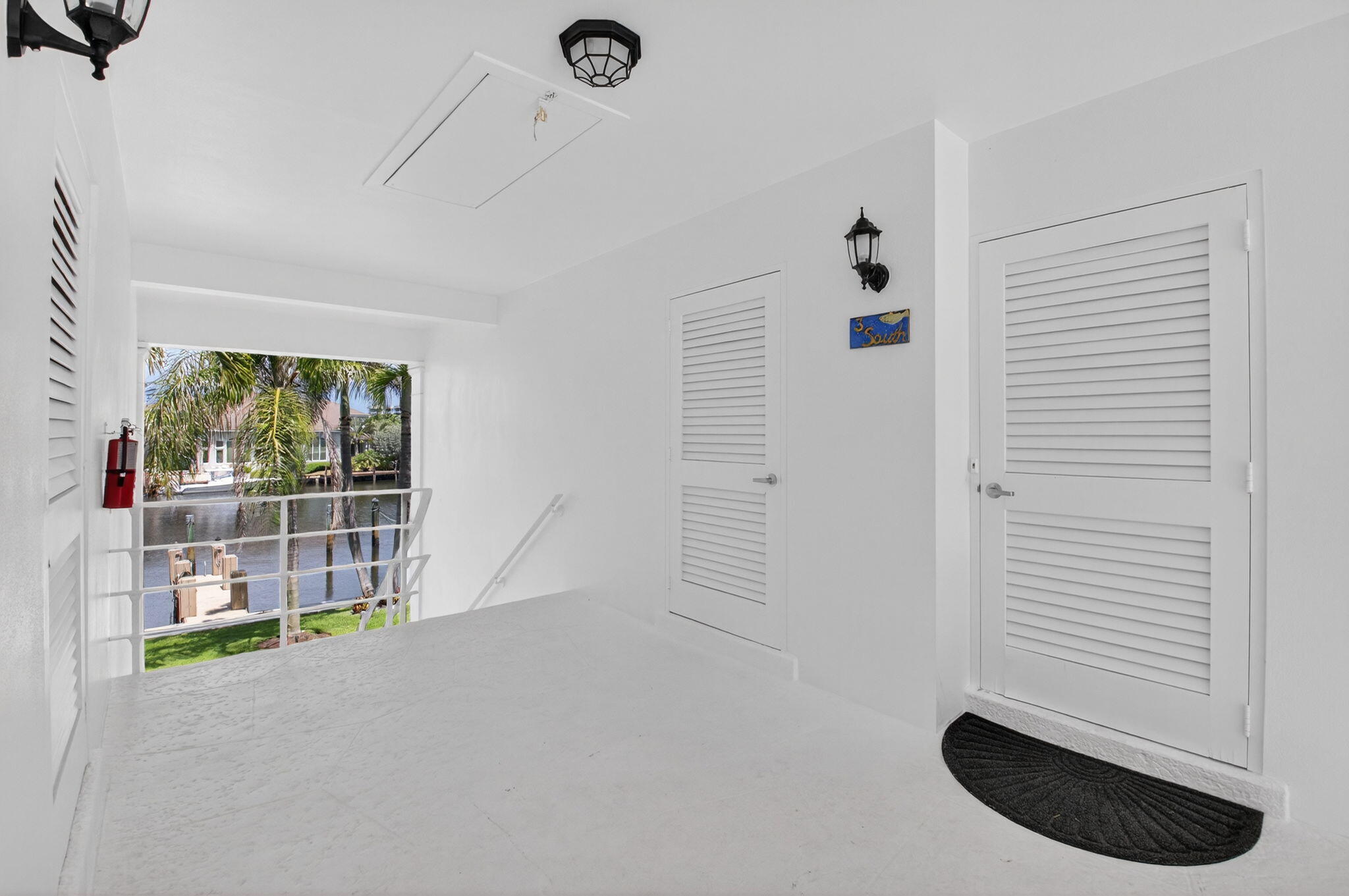 1710 South Ocean Boulevard, Unit 32 Delray Beach, FL 33483 - Photo 56 of 58 an empty room with windows