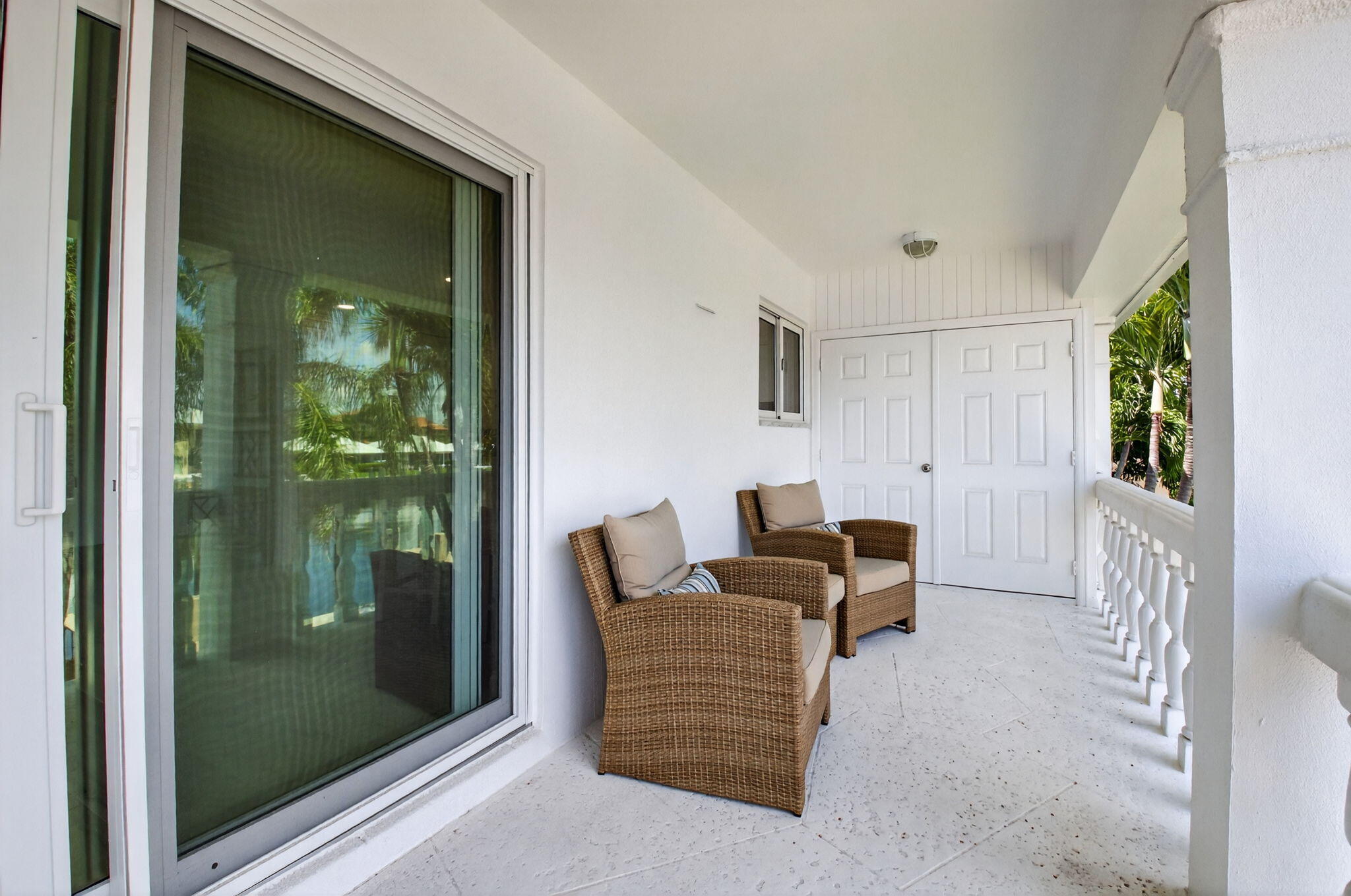 1710 South Ocean Boulevard, Unit 32 Delray Beach, FL 33483 - Photo 8 of 58 a living room with furniture and a window